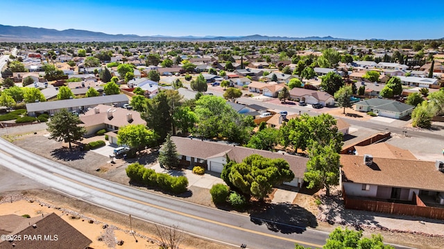 7869 Spouse Dr, Prescott Valley, AZ 86314 - aerial perspective of suburban area with a mountain backdrop