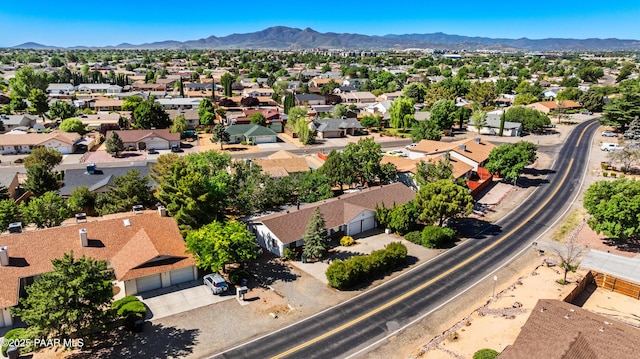 7869 Spouse Dr, Prescott Valley, AZ 86314 - aerial perspective of suburban area featuring a mountain backdrop