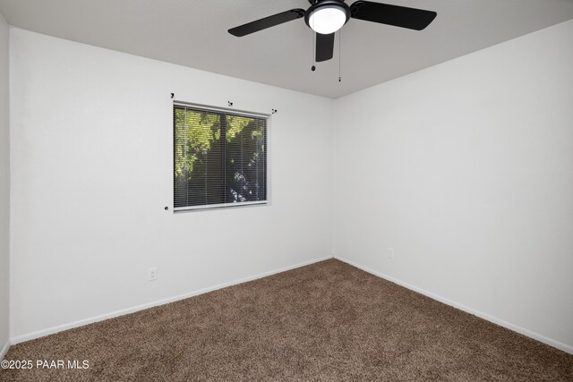 7869 Spouse Dr, Prescott Valley, AZ 86314 - spare room featuring carpet and ceiling fan