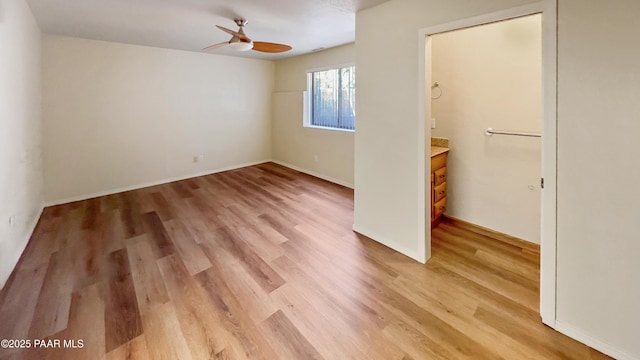 941 Custer Ln, Prescott, AZ 86305 - unfurnished bedroom featuring light wood-style flooring, baseboards, and ceiling fan