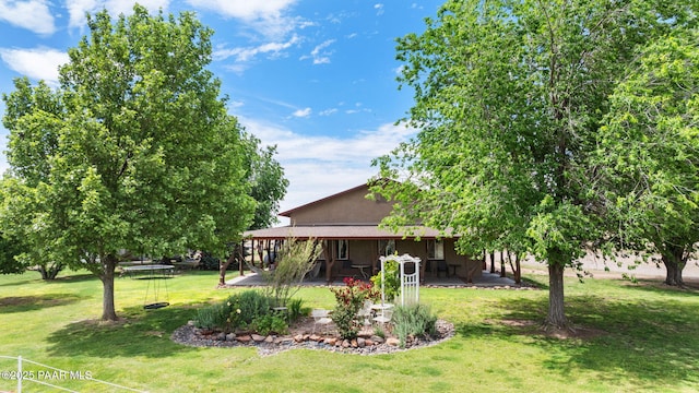 3900 W Runway Rd, Paulden, AZ 86334 - view of green lawn with a patio