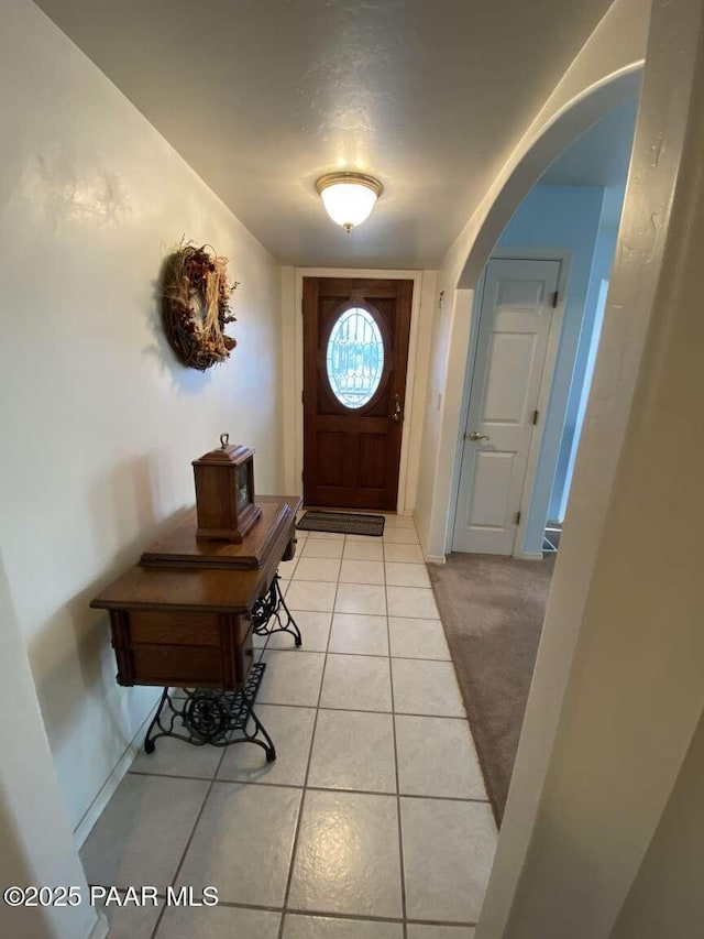 1350 W Justray Ranch Rd, Chino Valley, AZ 86323 - entrance foyer featuring light tile patterned floors and arched walkways