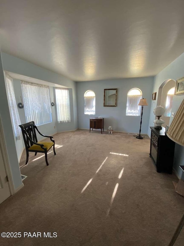 1350 W Justray Ranch Rd, Chino Valley, AZ 86323 - living area with carpet floors and arched walkways