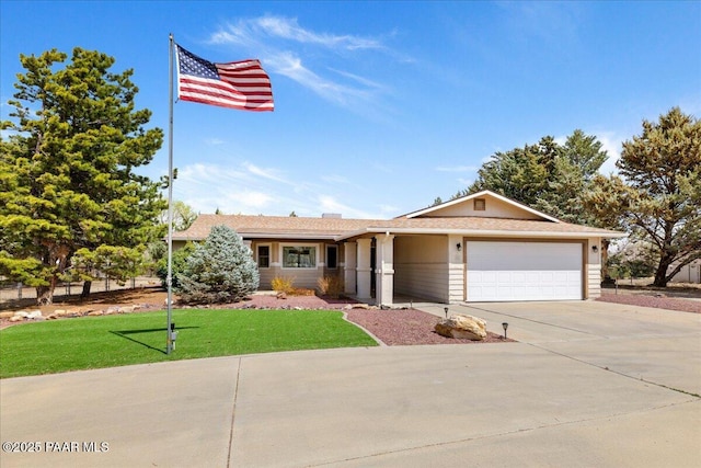 ranch-style house featuring a front yard, an attached garage, stucco siding, and concrete driveway