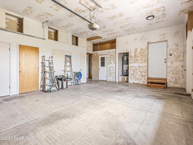 18301 S Peeples Valley Rd, Peeples Valley, AZ 86332 - garage with water heater and a garage door opener