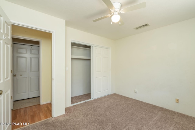 439 Foxfire Ln, Prescott, AZ 86301 - unfurnished bedroom with a closet, carpet flooring, and a ceiling fan