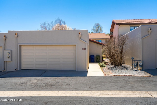 439 Foxfire Ln, Prescott, AZ 86301 - pueblo-style house with stucco siding and a tiled roof