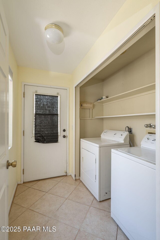439 Foxfire Ln, Prescott, AZ 86301 - washroom featuring separate washer and dryer and light tile patterned flooring