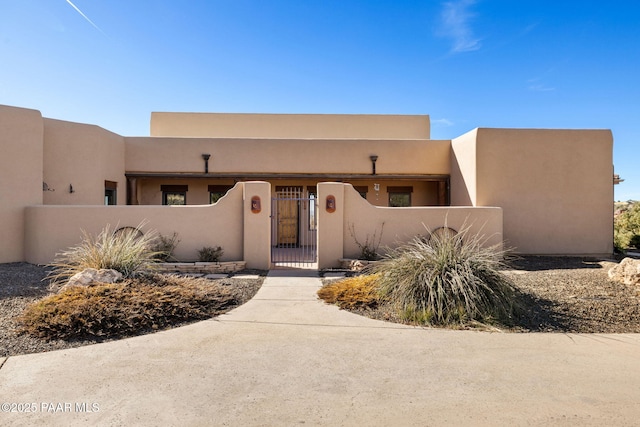 view of pueblo revival-style home