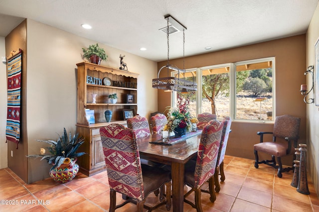 view of tiled dining space