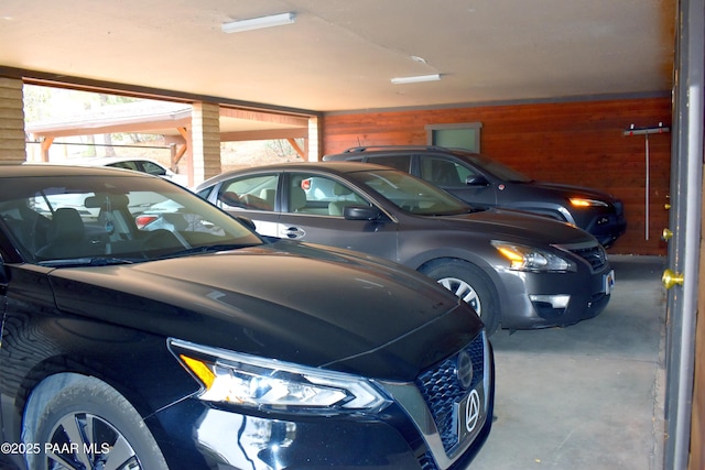 garage with wood walls