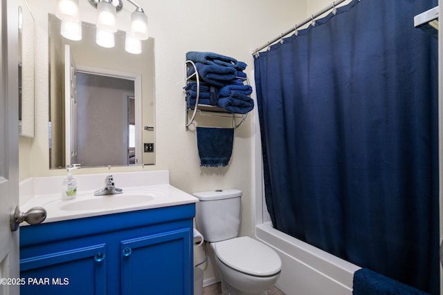 bathroom with vanity, toilet, and shower / tub combo with curtain