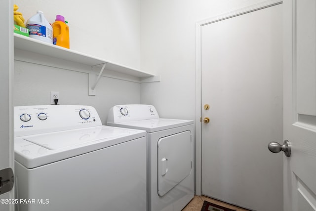 laundry room with laundry area and washer and clothes dryer