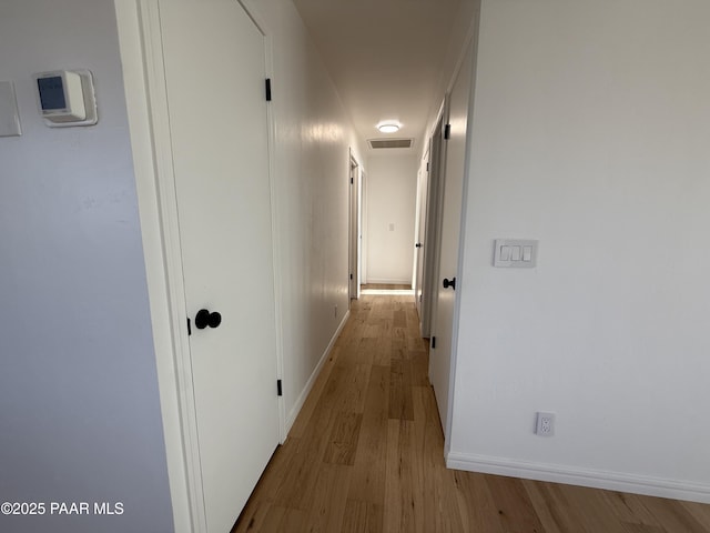 8470 E Sommer Dr, Prescott Valley, AZ 86314 - hallway featuring wood finished floors and baseboards