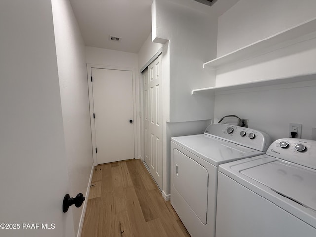 8470 E Sommer Dr, Prescott Valley, AZ 86314 - laundry area featuring washer and clothes dryer and light wood finished floors