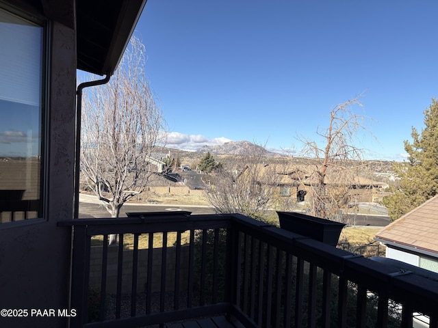 balcony featuring a mountain view