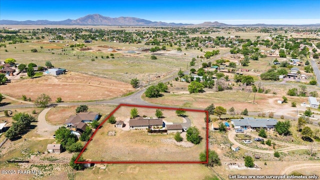 455 Bernice Dr, Chino Valley, AZ 86323 - aerial view of sparsely populated area featuring property parcel outlined and a mountainous background