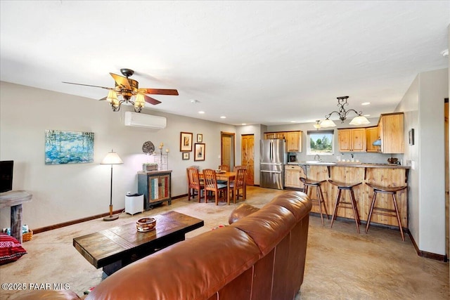 455 Bernice Dr, Chino Valley, AZ 86323 - living area featuring a wall mounted AC, baseboards, recessed lighting, and a ceiling fan
