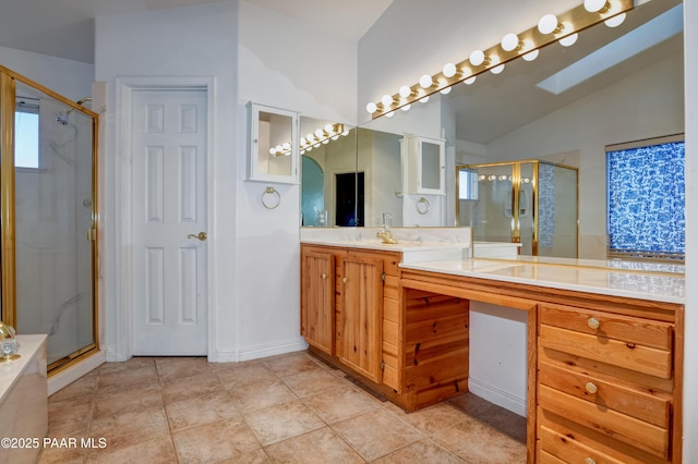 bathroom featuring tile patterned floors, vanity, an enclosed shower, and lofted ceiling with skylight