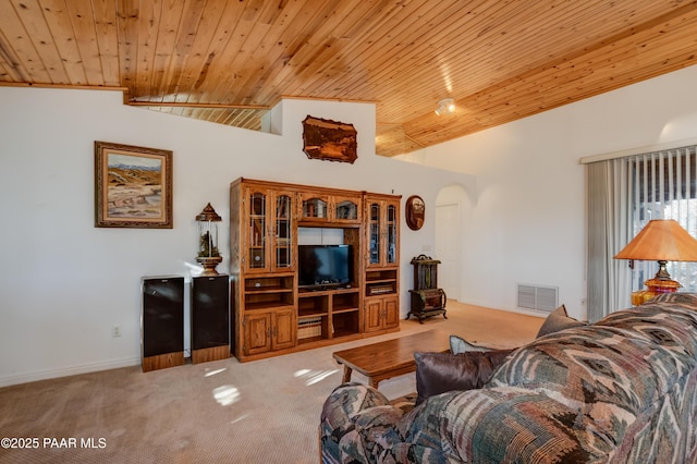 carpeted living room with wooden ceiling and lofted ceiling