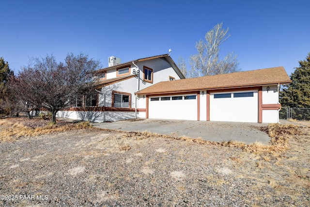 front of property featuring a garage