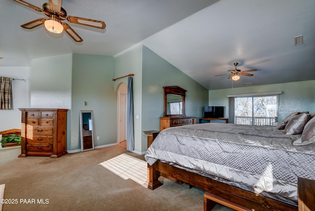 bedroom featuring ceiling fan, lofted ceiling, and light carpet