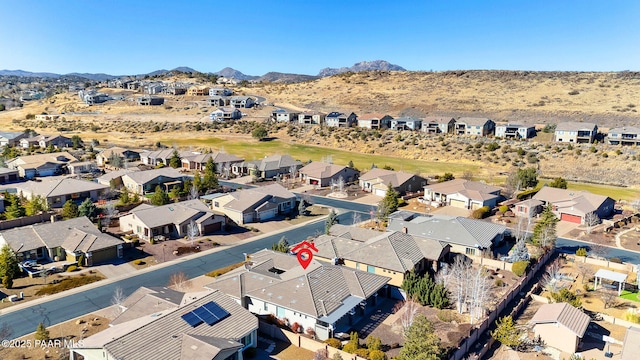 drone / aerial view featuring a mountain view