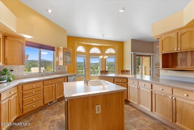 1330 Solar Heights Dr, Prescott, AZ 86303 - kitchen featuring a sink, light countertops, tasteful backsplash, pendant lighting, and recessed lighting