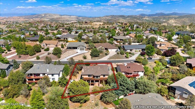 1536 Hawkeye Ridge Ave, Prescott, AZ 86301 - aerial view of residential area featuring property boundaries highlighted and a mountainous background