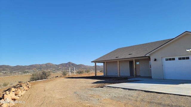 12880 E Brody Trl, Dewey-Humboldt, AZ 86327 - view of yard featuring a mountain view and a garage