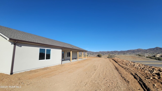 12880 E Brody Trl, Dewey-Humboldt, AZ 86327 - view of dirt / gravel driveway featuring a mountain view