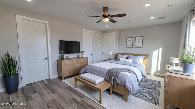 12880 E Brody Trl, Dewey-Humboldt, AZ 86327 - bedroom with recessed lighting, dark wood-style flooring, ceiling fan, and baseboards