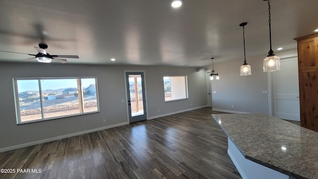12880 E Brody Trl, Dewey-Humboldt, AZ 86327 - unfurnished living room featuring healthy amount of natural light, ceiling fan, dark wood-style floors, recessed lighting, and baseboards