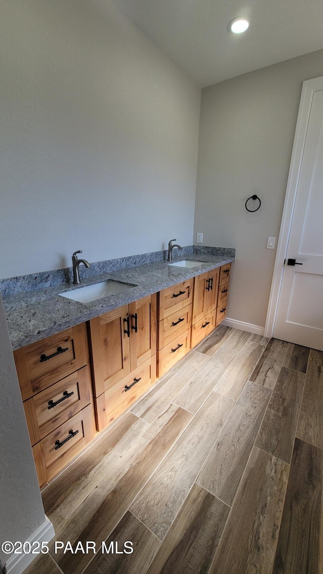 12880 E Brody Trl, Dewey-Humboldt, AZ 86327 - full bath with wood finished floors, double vanity, and baseboards