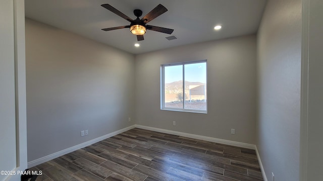 12880 E Brody Trl, Dewey-Humboldt, AZ 86327 - empty room with dark wood finished floors, recessed lighting, ceiling fan, and baseboards