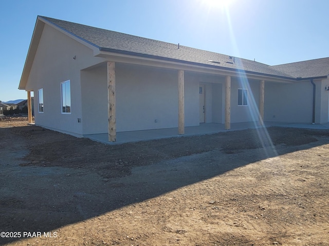 12880 E Brody Trl, Dewey-Humboldt, AZ 86327 - back of house with stucco siding and roof with shingles