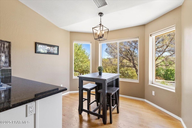 1520 Majestic Way, Prescott, AZ 86301 - dining area with healthy amount of natural light, a chandelier, and baseboards