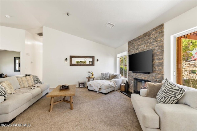1520 Majestic Way, Prescott, AZ 86301 - living area with light carpet, lofted ceiling, and a fireplace