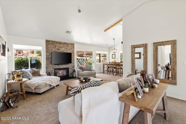 1520 Majestic Way, Prescott, AZ 86301 - carpeted living room featuring plenty of natural light, lofted ceiling, a fireplace, and baseboards