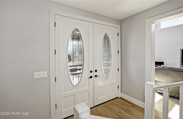 10190 N Prescott Ridge Rd, Prescott Valley, AZ 86315 - foyer entrance featuring plenty of natural light and light hardwood / wood-style flooring