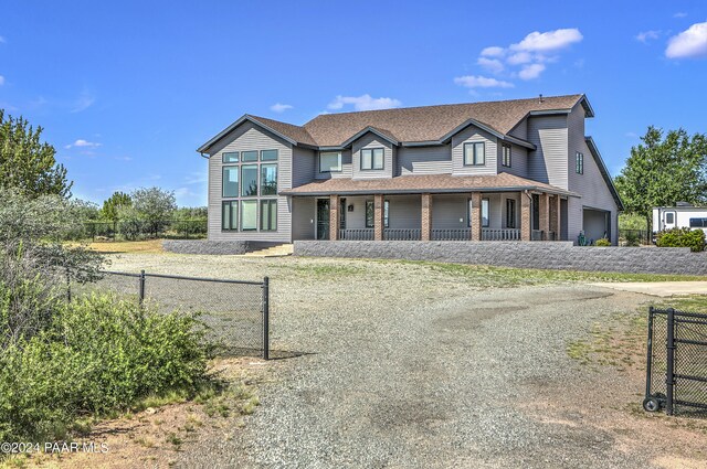 10190 N Prescott Ridge Rd, Prescott Valley, AZ 86315 - view of front facade with covered porch and a garage