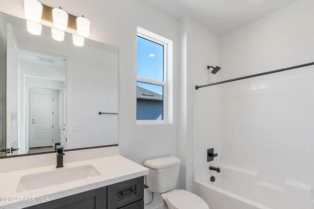 full bathroom with vanity, shower / bathtub combination, and toilet