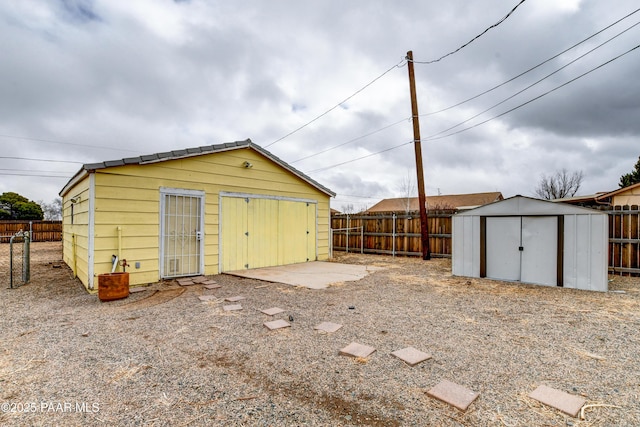 view of shed featuring a fenced backyard