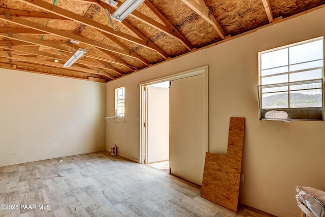 interior space featuring vaulted ceiling