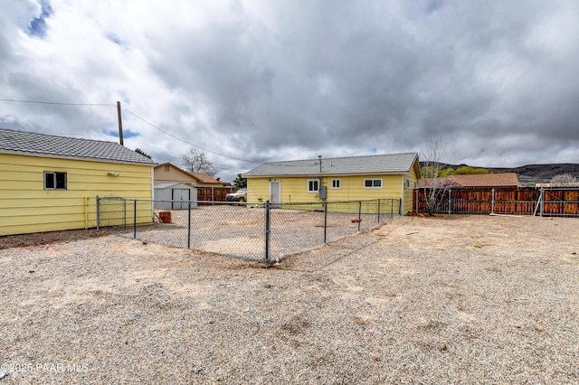 view of yard with an outbuilding and fence private yard