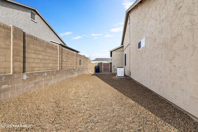 view of yard with central AC