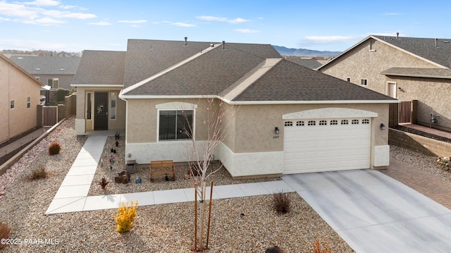 single story home featuring a garage