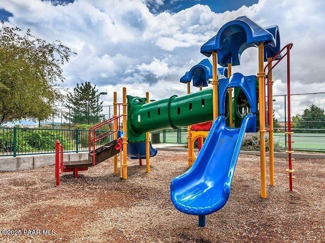 community jungle gym with fence