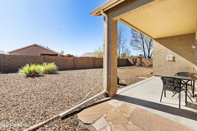 view of patio with a fenced backyard