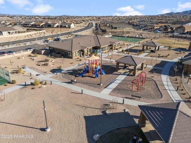 bird's eye view with a residential view and a mountain view